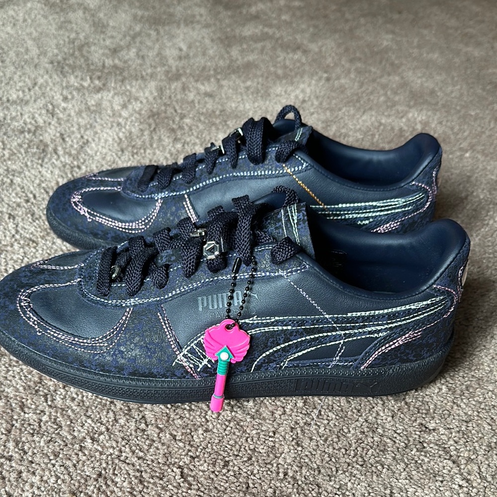 PUMA leather sneakers in navy with pastel stitching